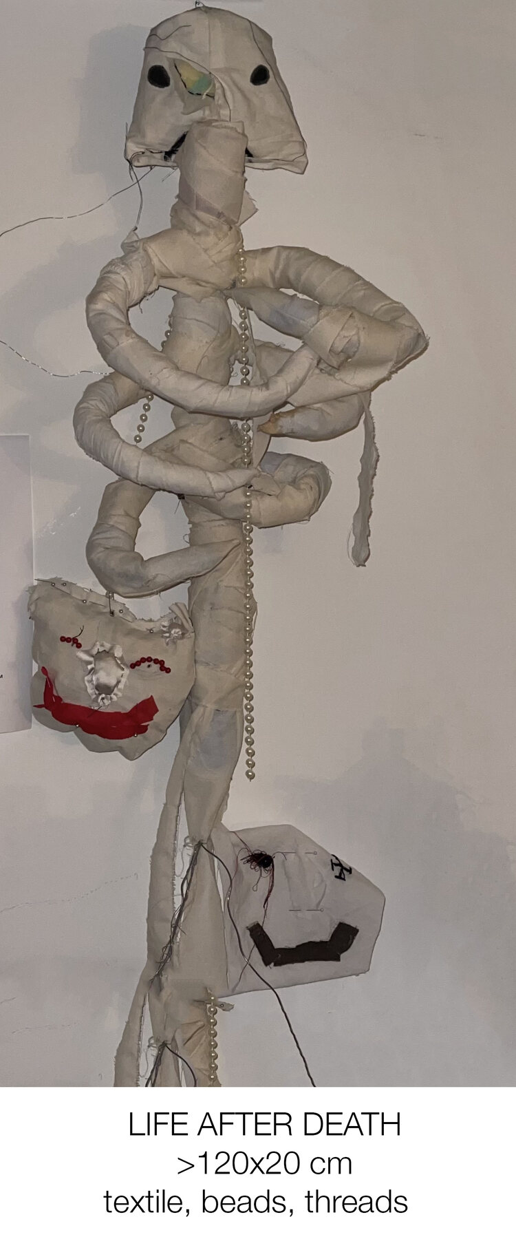 Life After Death — textile, beads, threads