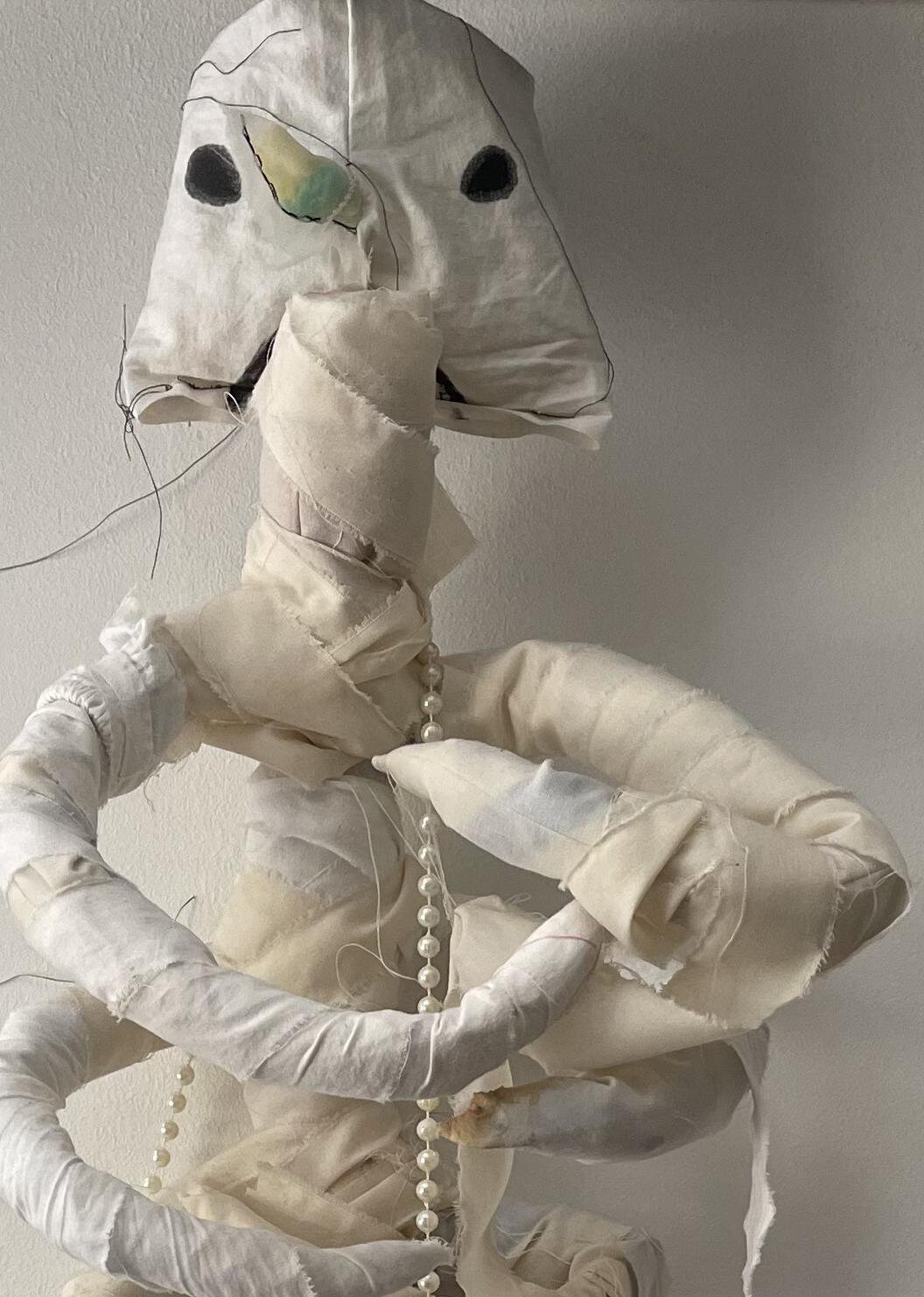 Life After Death — 2025, fabric, wire, beads, found materials, 120×50 cm